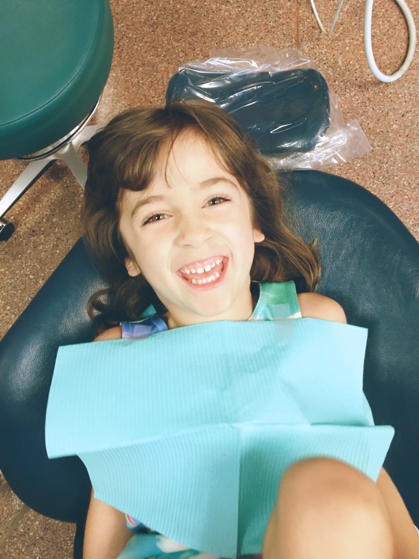 Happy Child in Dental Chair